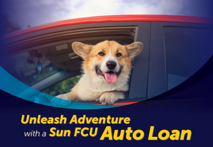 Corgi sitting in drivers seat of red car with text "Unleash Adventure with a Sun FCU Auto Loan"